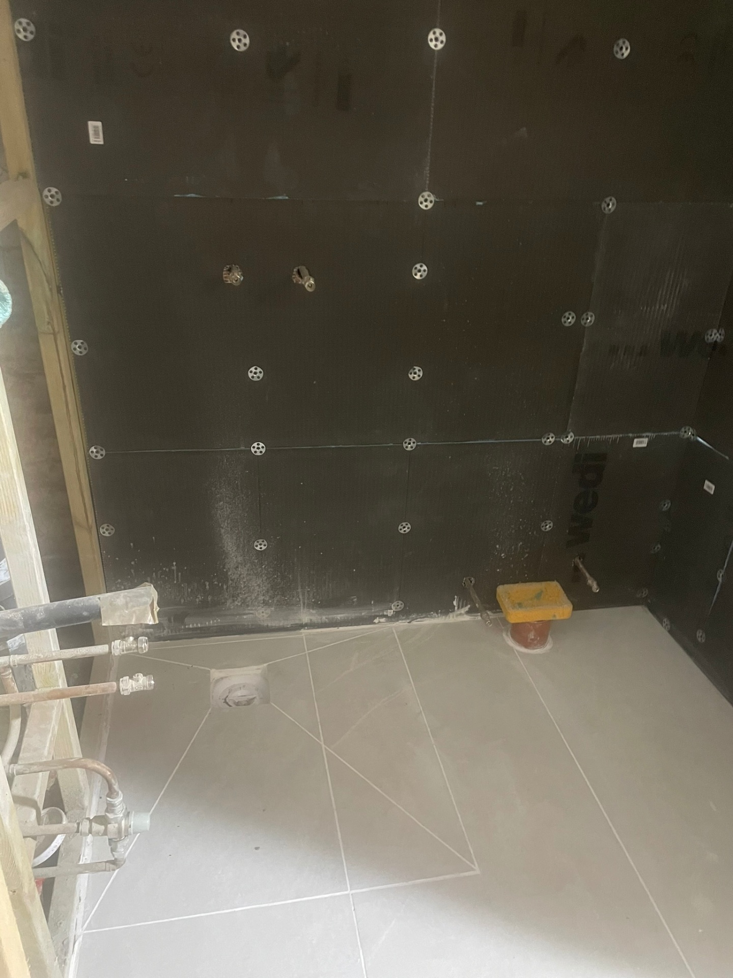 Wet room tanking and waterproofing in progress at an Ash Villa Development project in West London